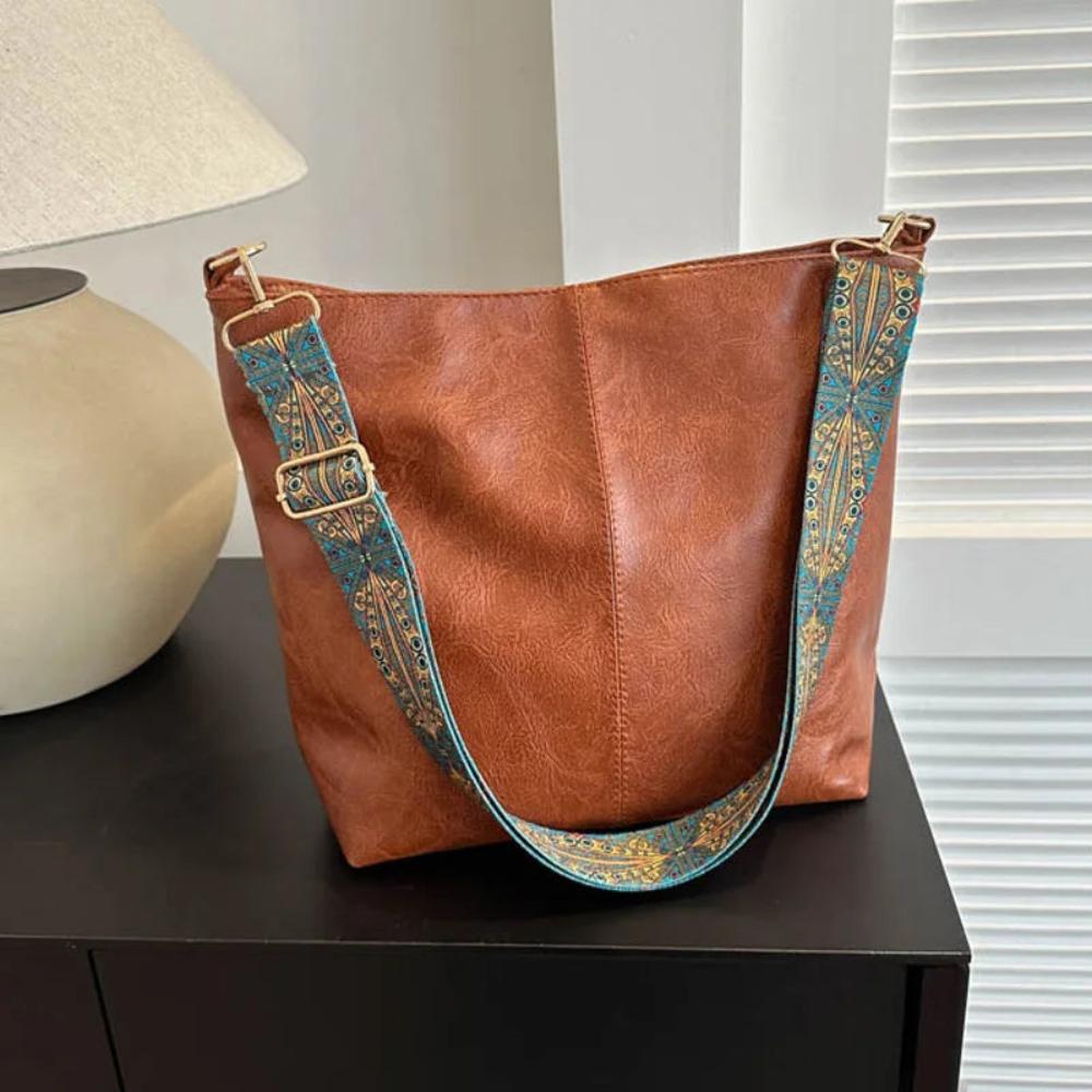 Elegante bolsa de hombro de piel vintage